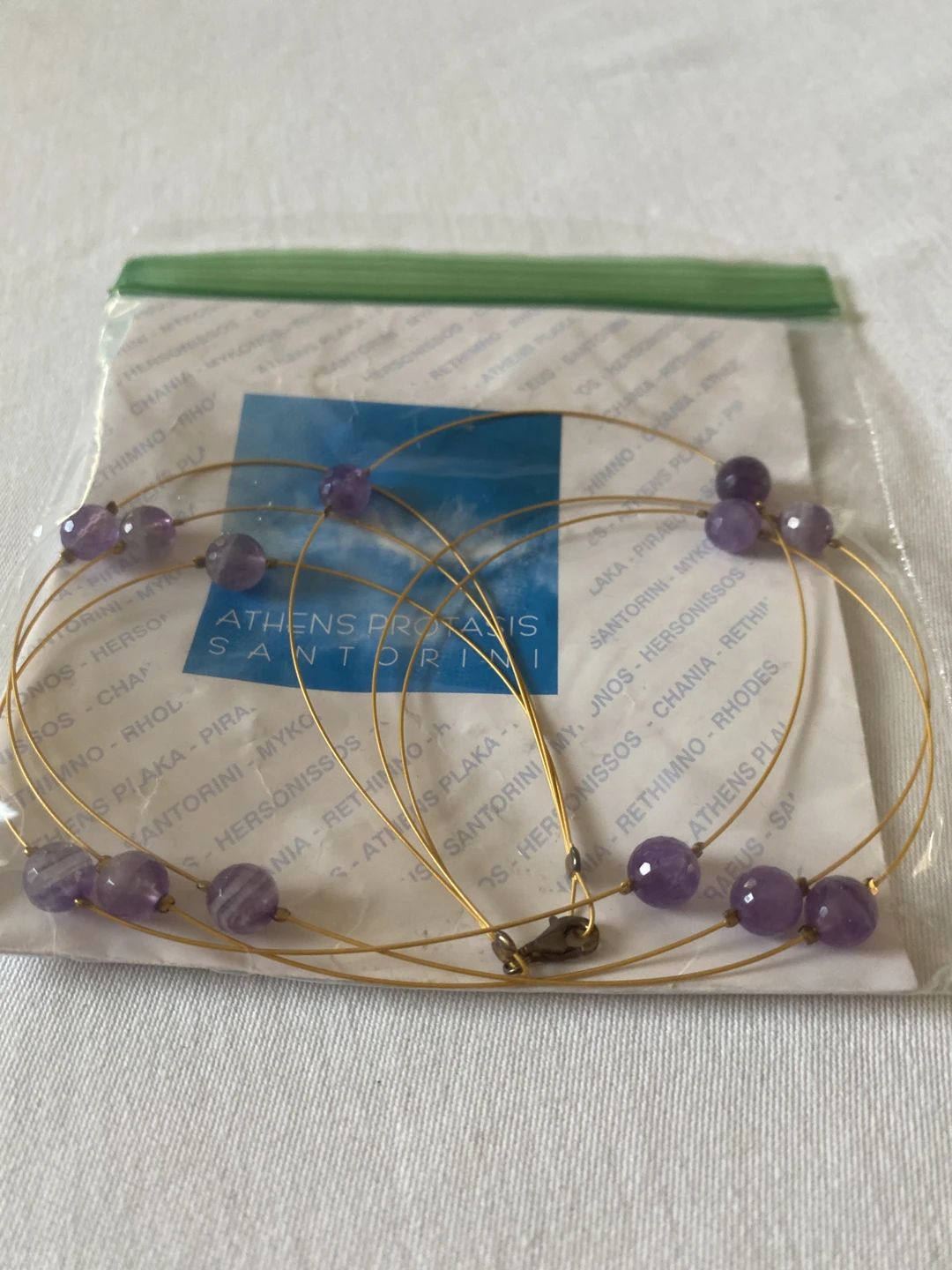 Amethyst beaded gold-tone wire necklace in original packaging