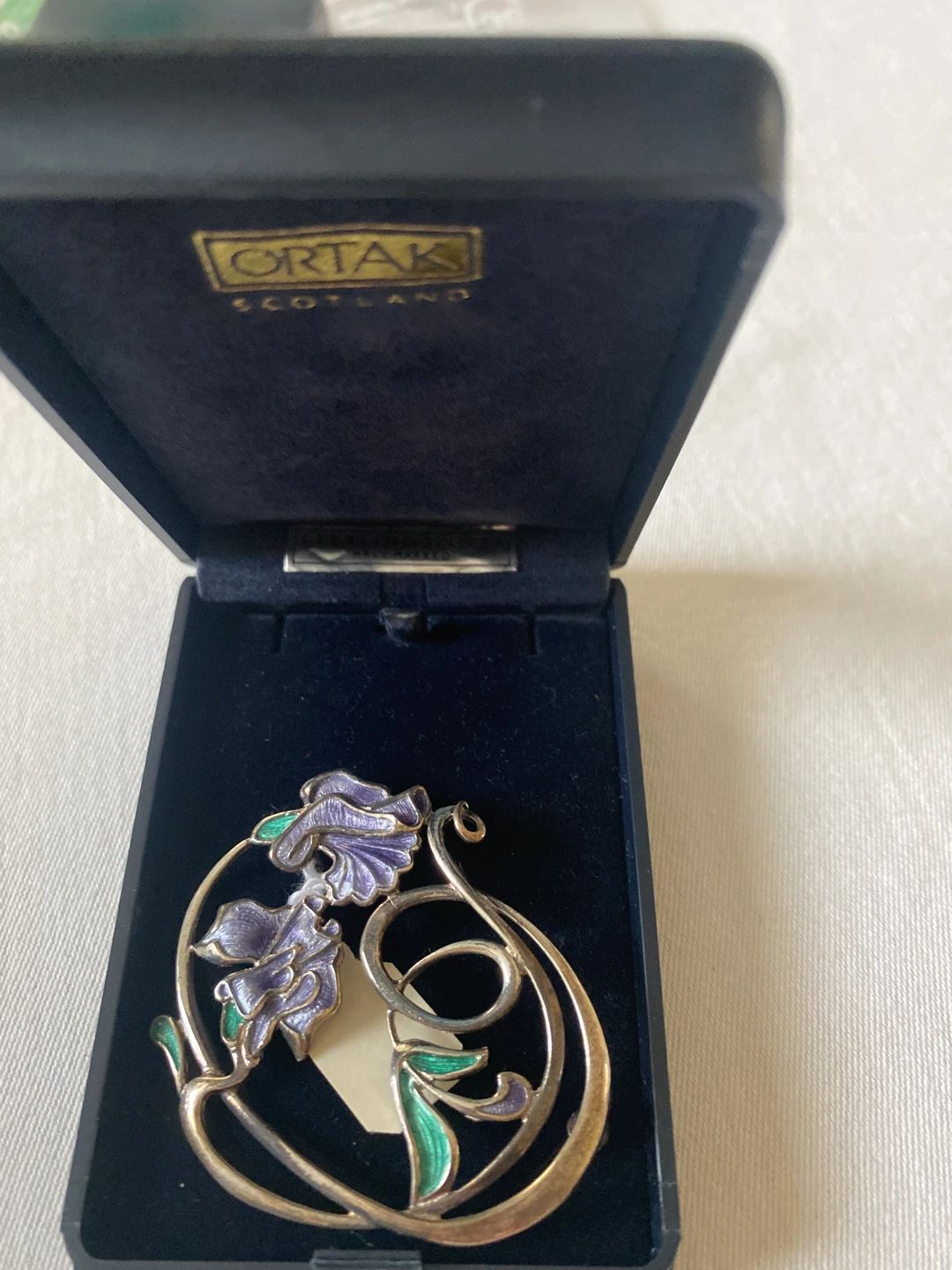 Ortak Scotland Art Nouveau style sterling silver and enamel floral brooch